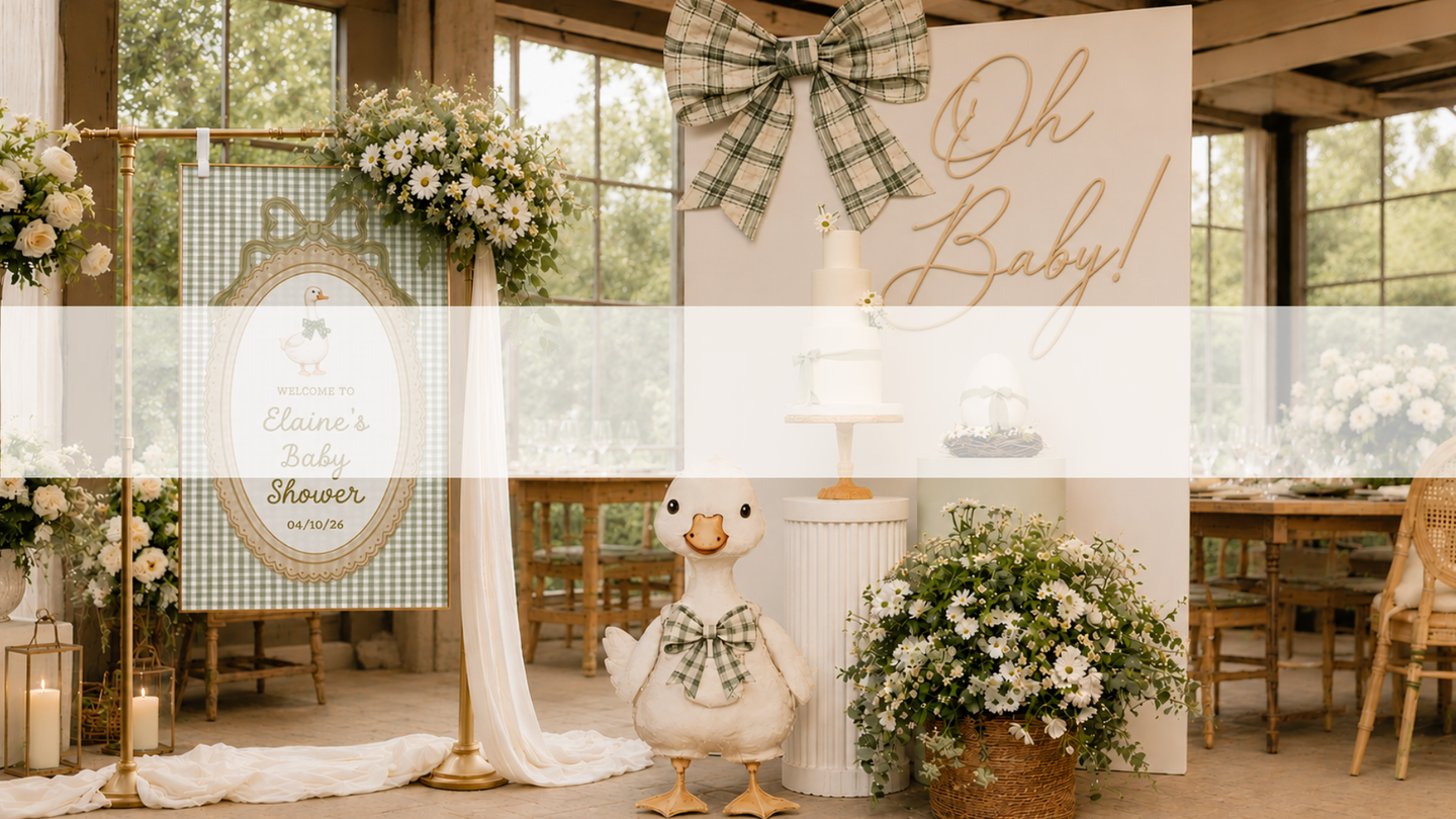 Decorative setup for a baby shower with floral arrangements, a sign, and a goose figurine.