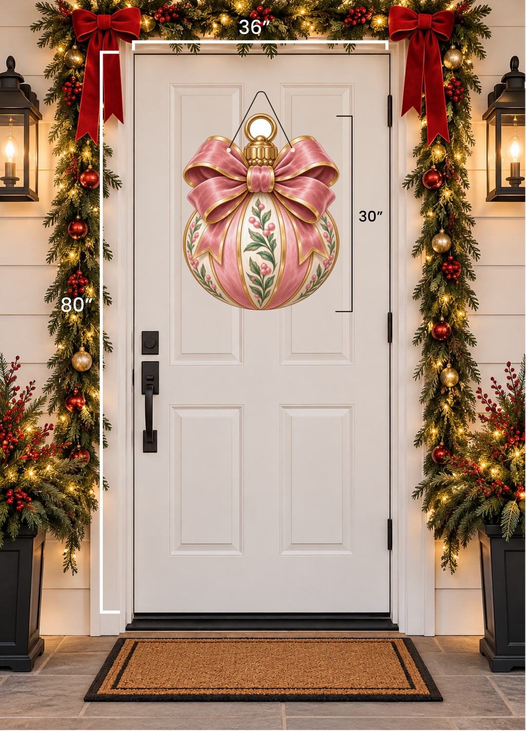 A large pink and gold Christmas nutcracker decoration displayed on a white front door, with holiday garlands, red bows, lights, and a doormat around it. A vertical measurement marker reads 30 inches.